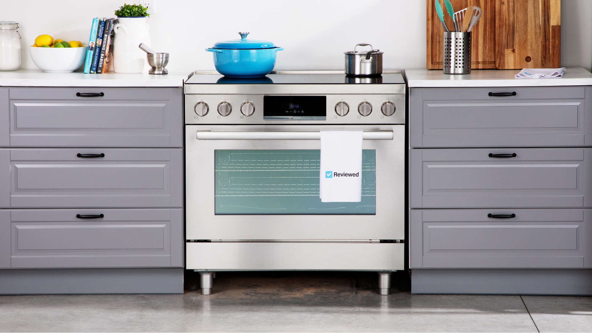 Bosch induction range in kitchen, with Dutch oven and pot placed on top