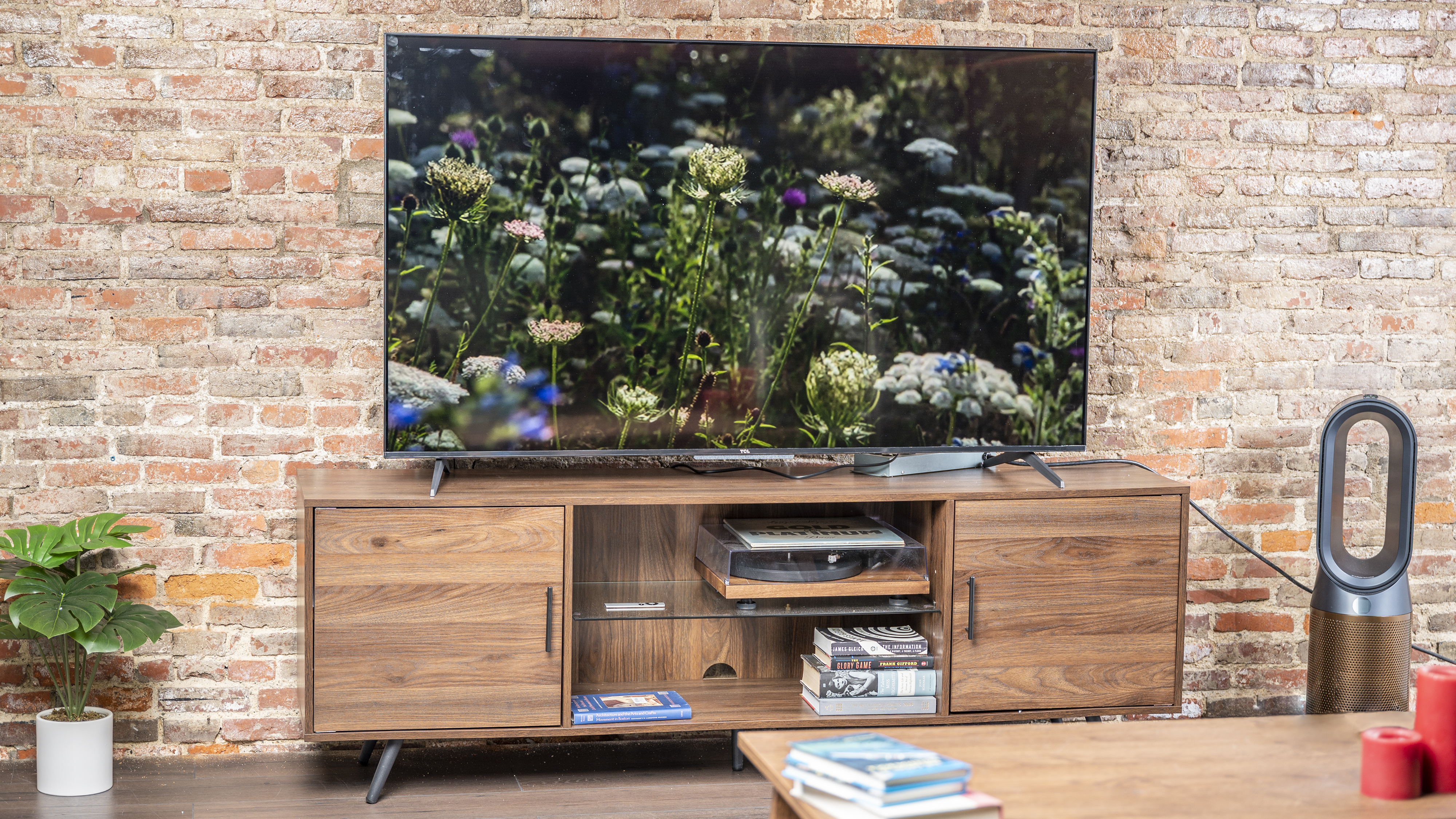 The TCL 5-Series with Google TV displaying 4K content in a living room setting