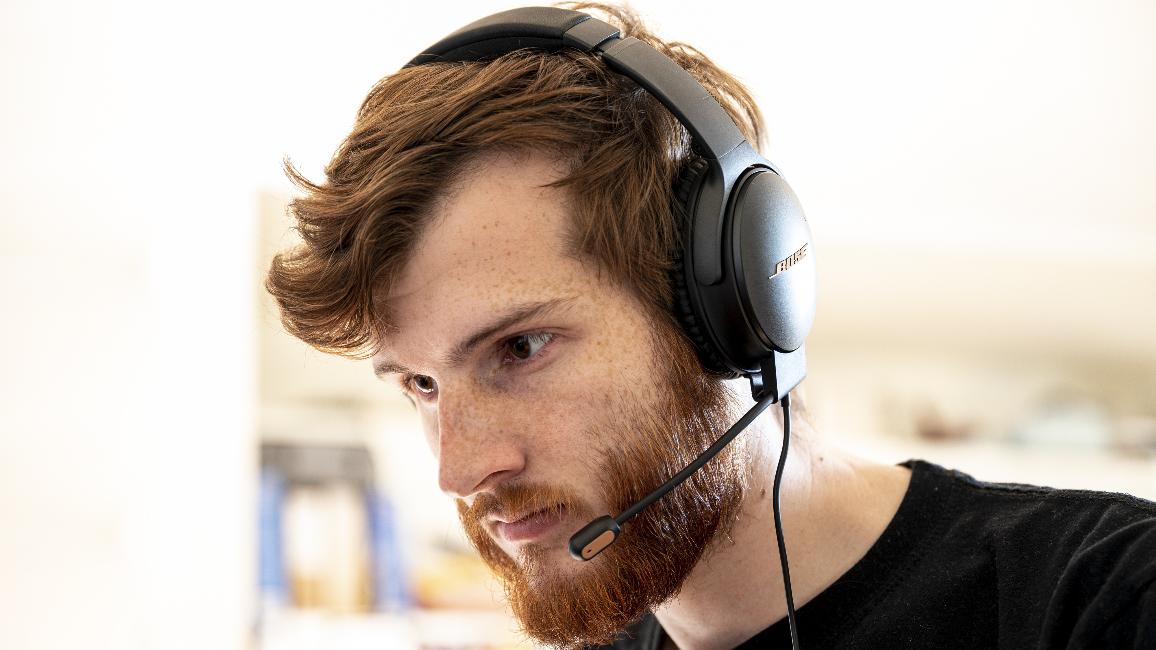 A man wearing a gaming headset