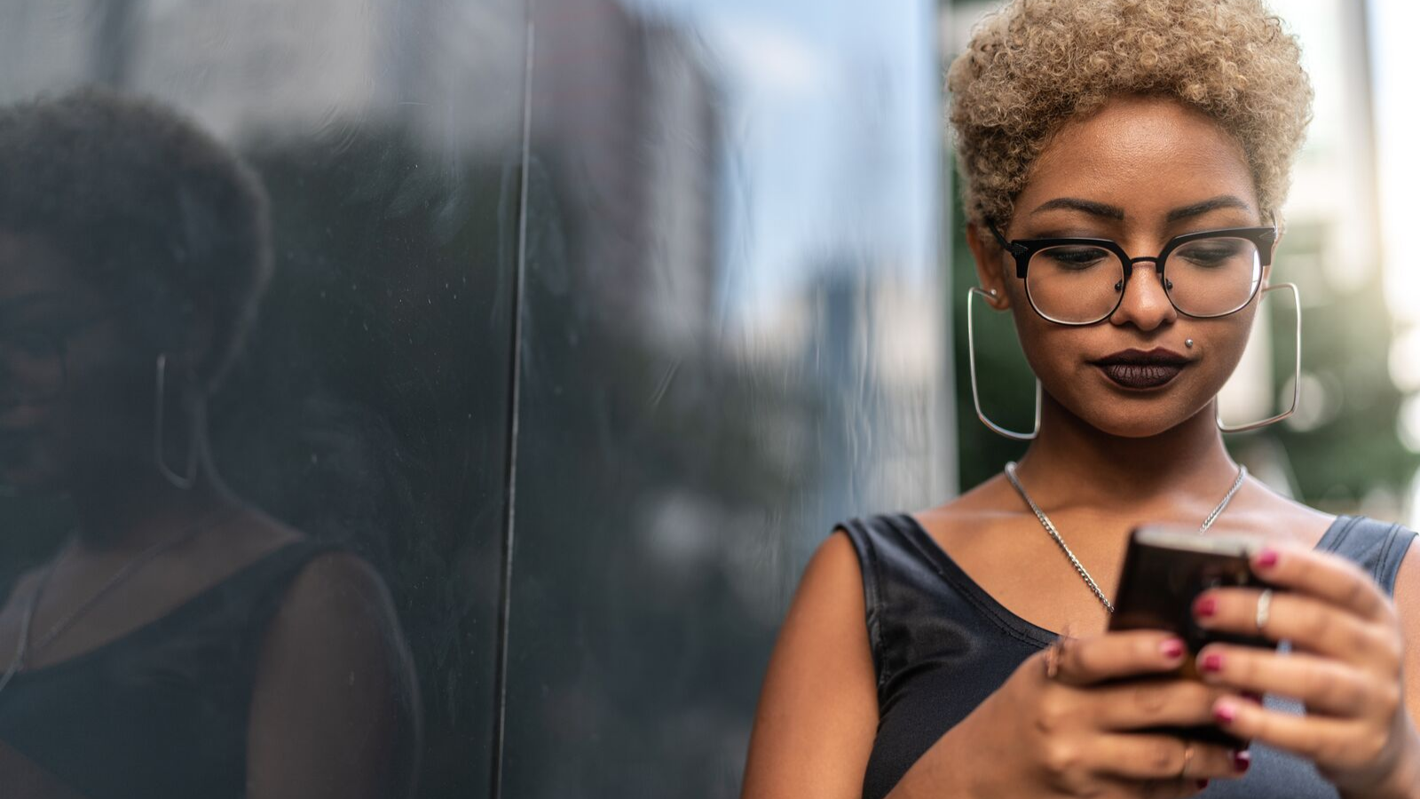 Woman looking at smartphone