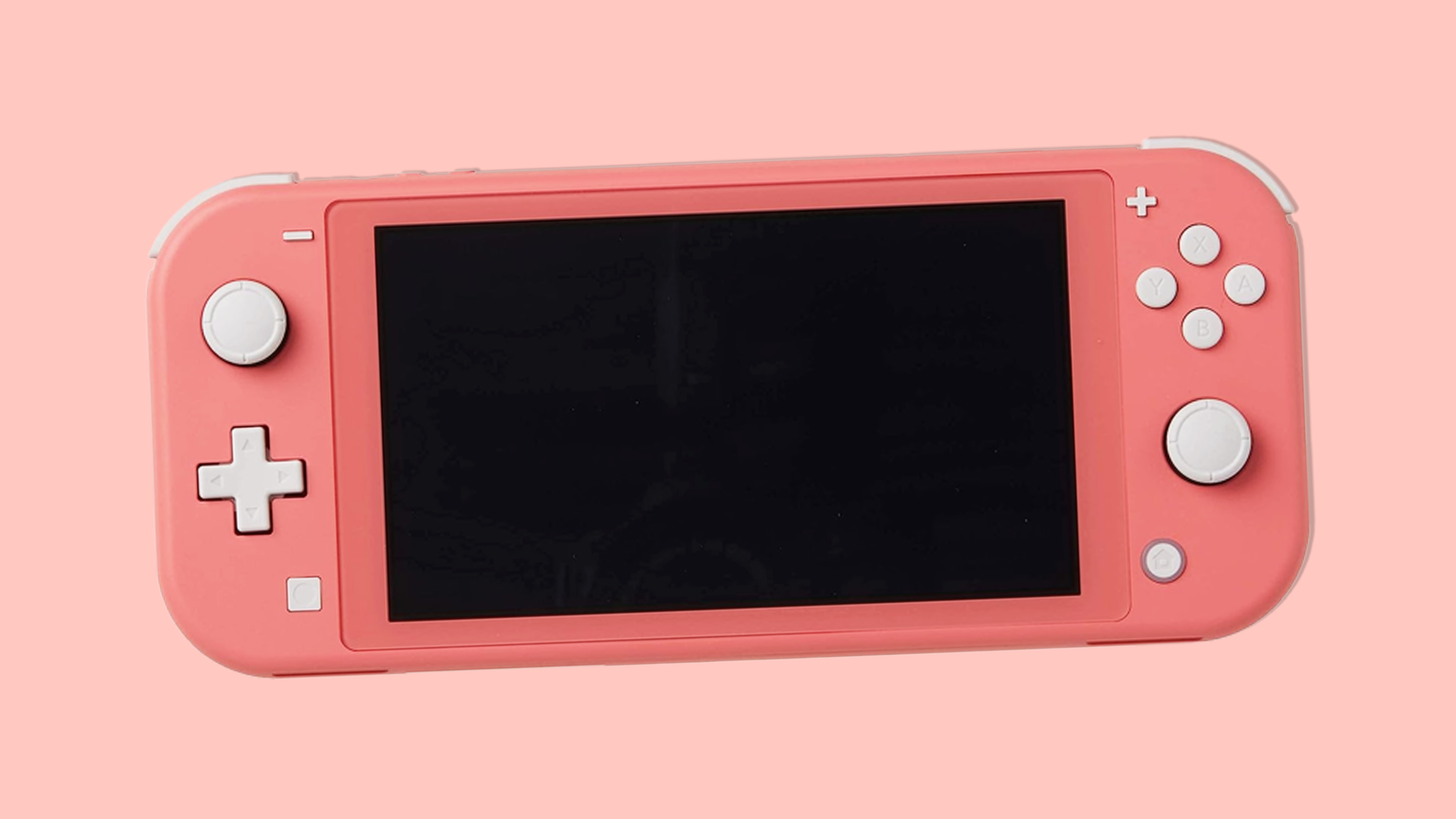 A Coral Nintendo Switch Lite on a pink background.